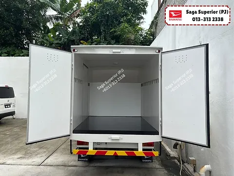 Daihatsu Gran Max luton van with rear doors open showing the empty cargo box and floor