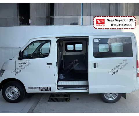 White Daihatsu Gran Max Semi-Panel Van with sliding door open