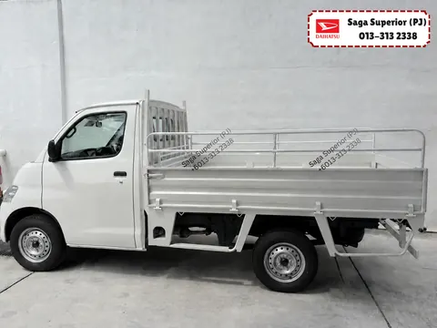 White Daihatsu Gran Max Pick-Up with the standard steel cargo body and headboard, side view, Saga Superior (PJ)